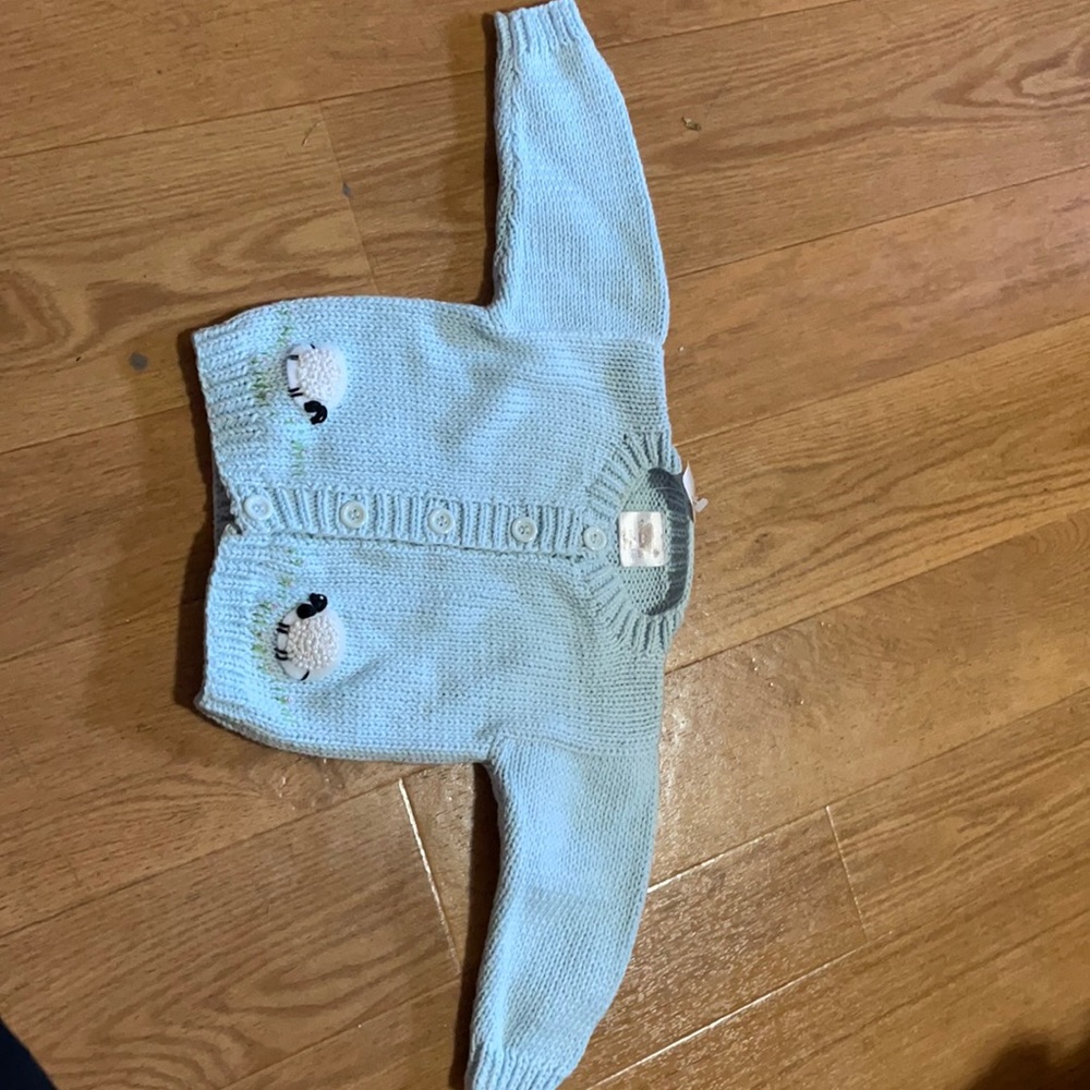 - Cotton baby sweater.